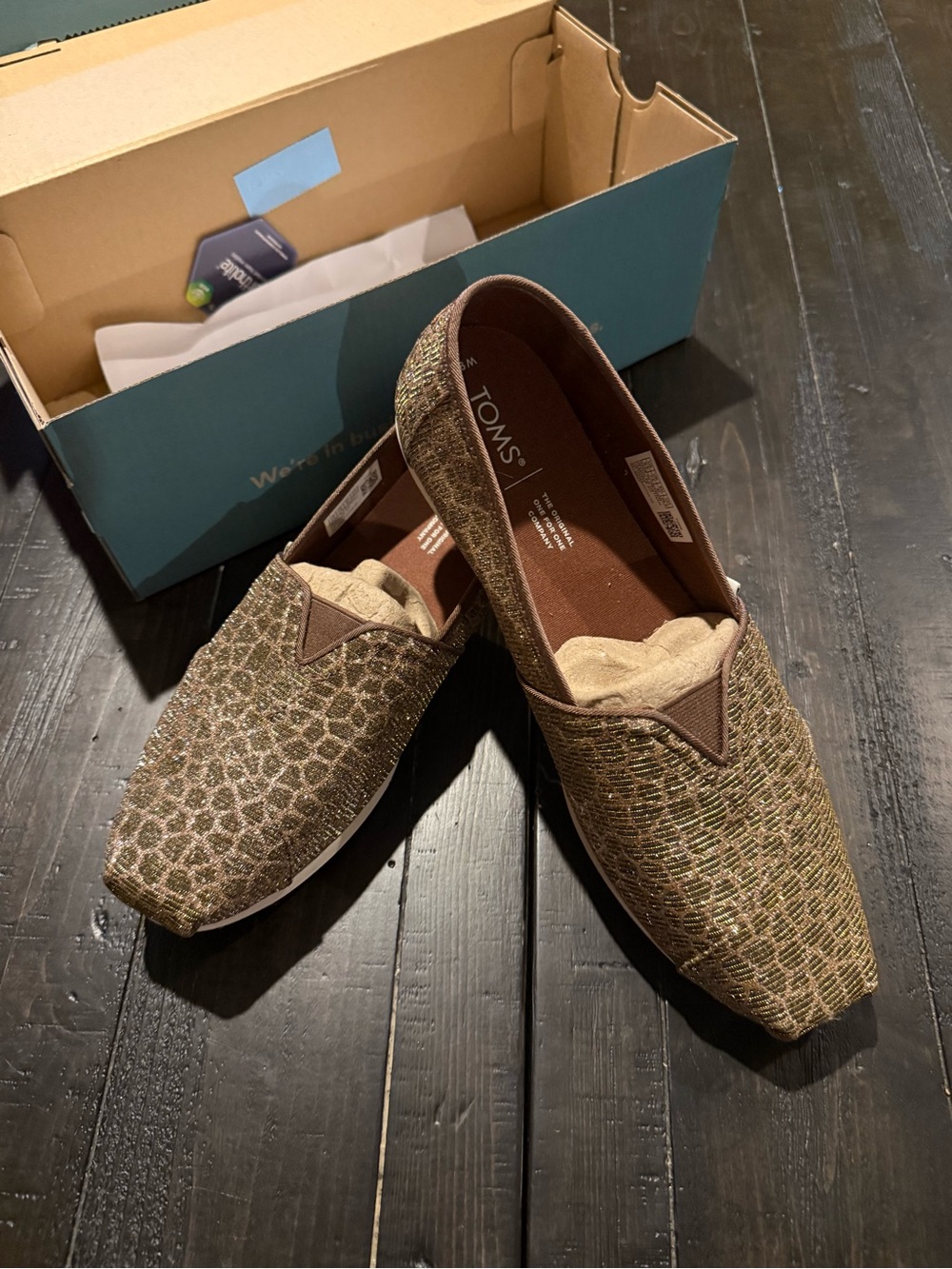 TOMS womenโs Slip-On Shoes in gold Brown
